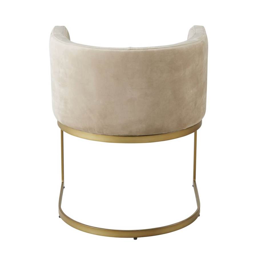 Fauteuil Requiem, en velours taupe avec pieds en acier coloris laiton, design élégant, disponible à Dakar, Sénégal