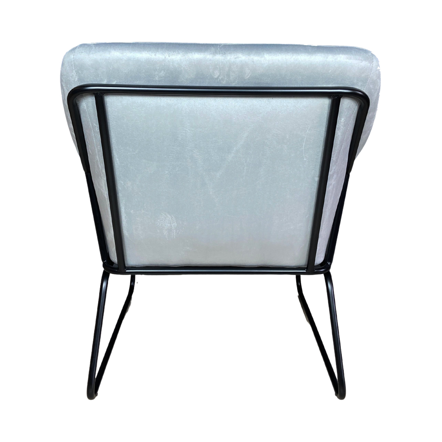 Dos du fauteuil en velours gris avec structure en métal noir, design moderne et robuste. Dakar, Sénégal.