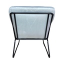 Dos du fauteuil en velours gris avec structure en métal noir, design moderne et robuste. Dakar, Sénégal.