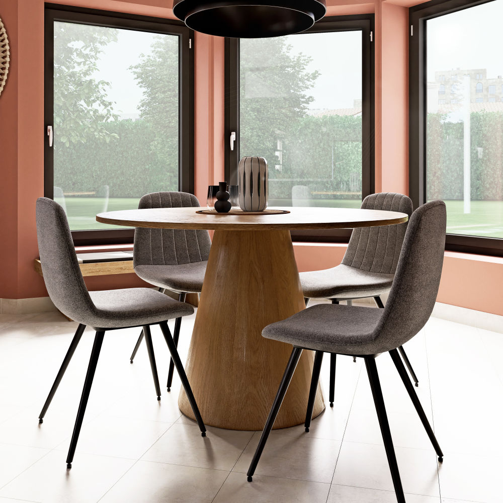Belle mise en situation de la chaise en velours Keira autour d'une table ronde. Dakar, Sénègal