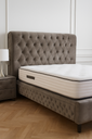 Tête de lit Elegant en velours beige capitonné