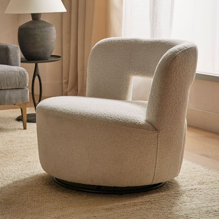 Fauteuil Eliza pivotant en tissu beige
