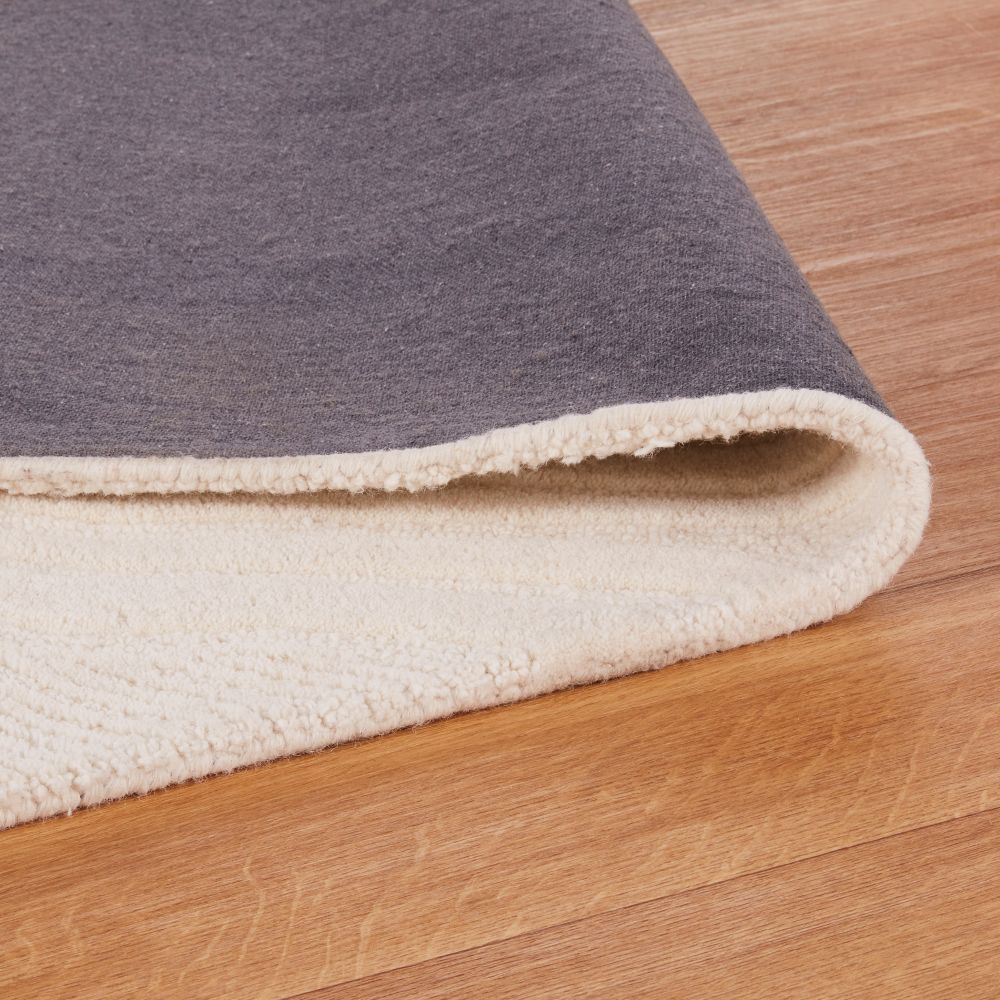 Tapis Jorari en laine tuftée et ciselée motif abstrait écru 160x230 disponible à Dakar, Sénégal