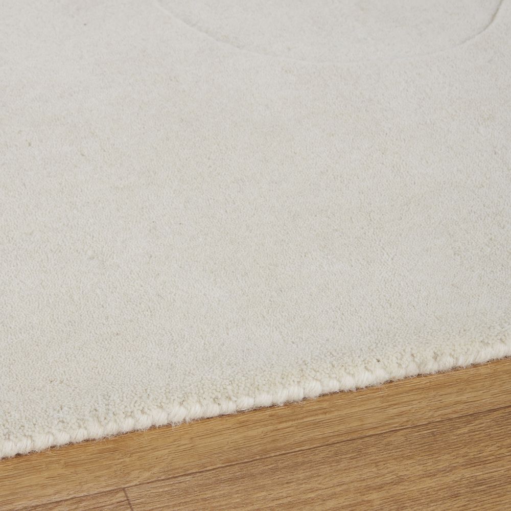 Tapis Guadalupe en laine tissée et ciselée motifs contemporains écrus 160x230